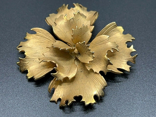 Broche/épingle vintage signée GIOVANNI en forme de fleur dorée