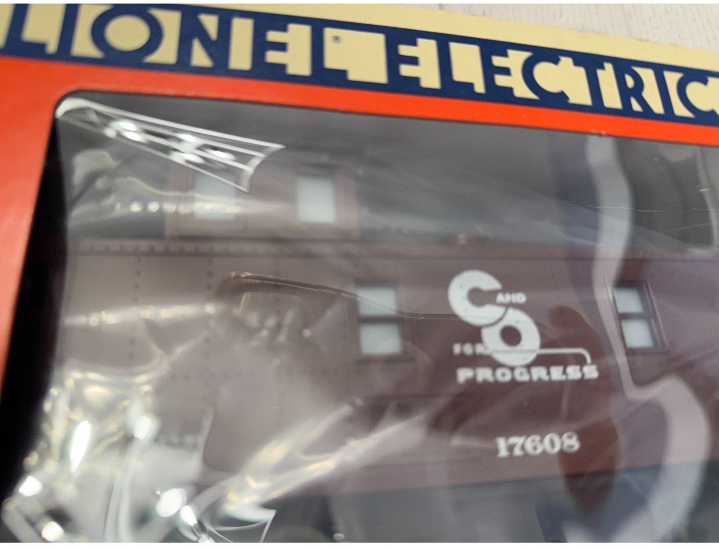 Model train set in packaging with Lionel Electric branding
