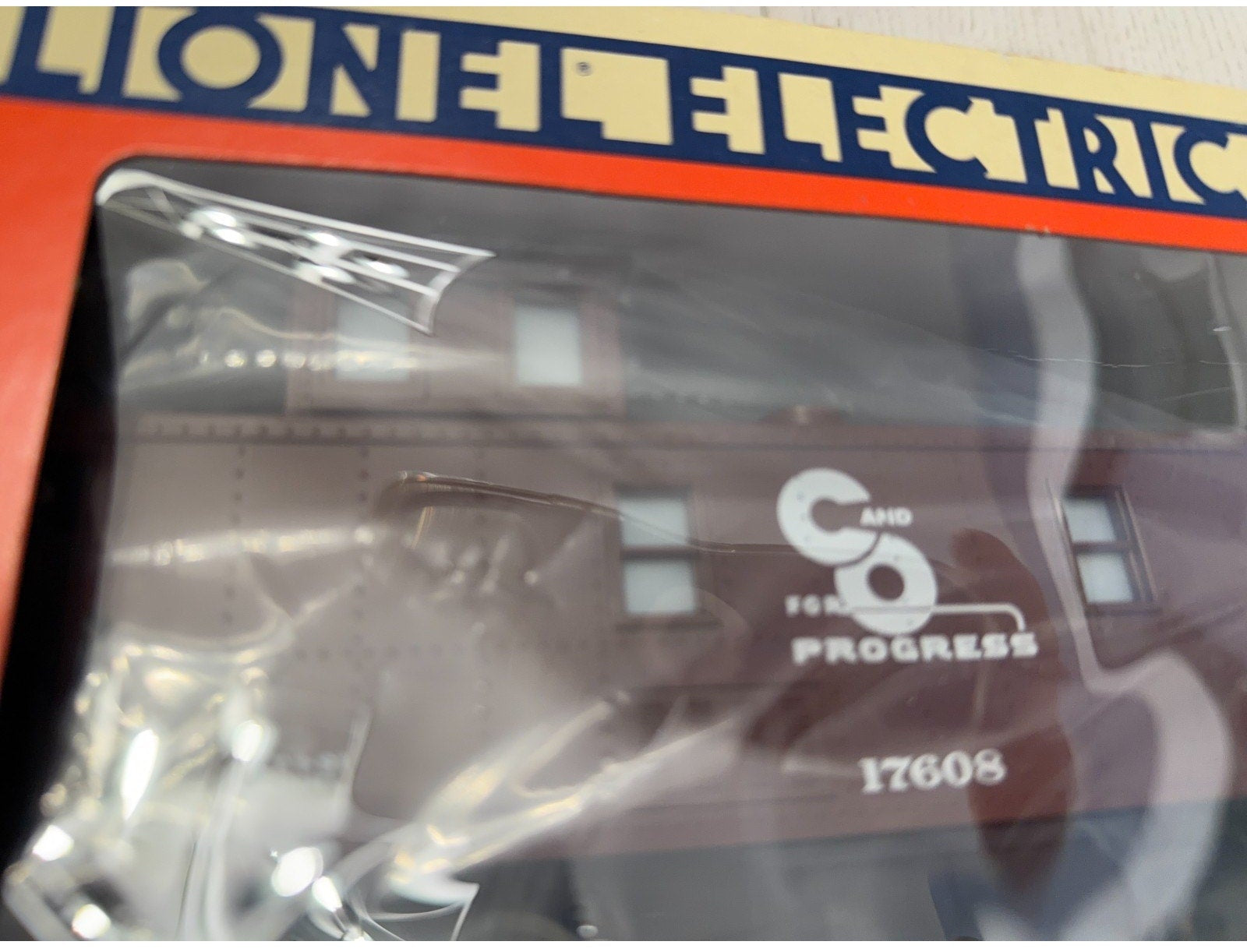 Model train set in packaging with Lionel Electric branding