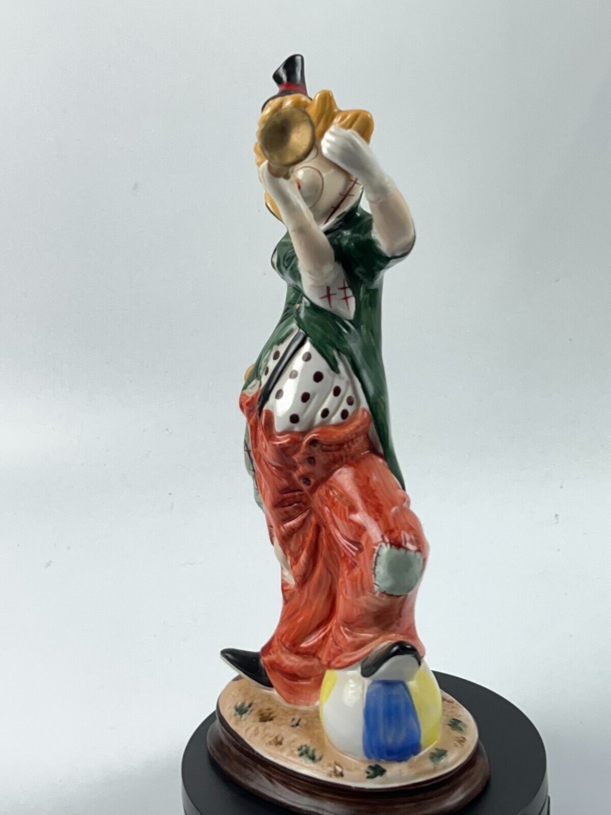 Vintage 11" Clown Blowing a Horn with a Foot on Beach Ball Statue Figurine