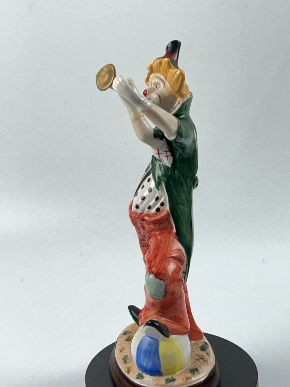 Vintage 11" Clown Blowing a Horn with a Foot on Beach Ball Statue Figurine