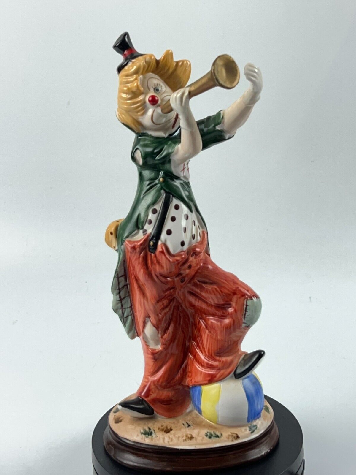 Vintage 11" Clown Blowing a Horn with a Foot on Beach Ball Statue Figurine