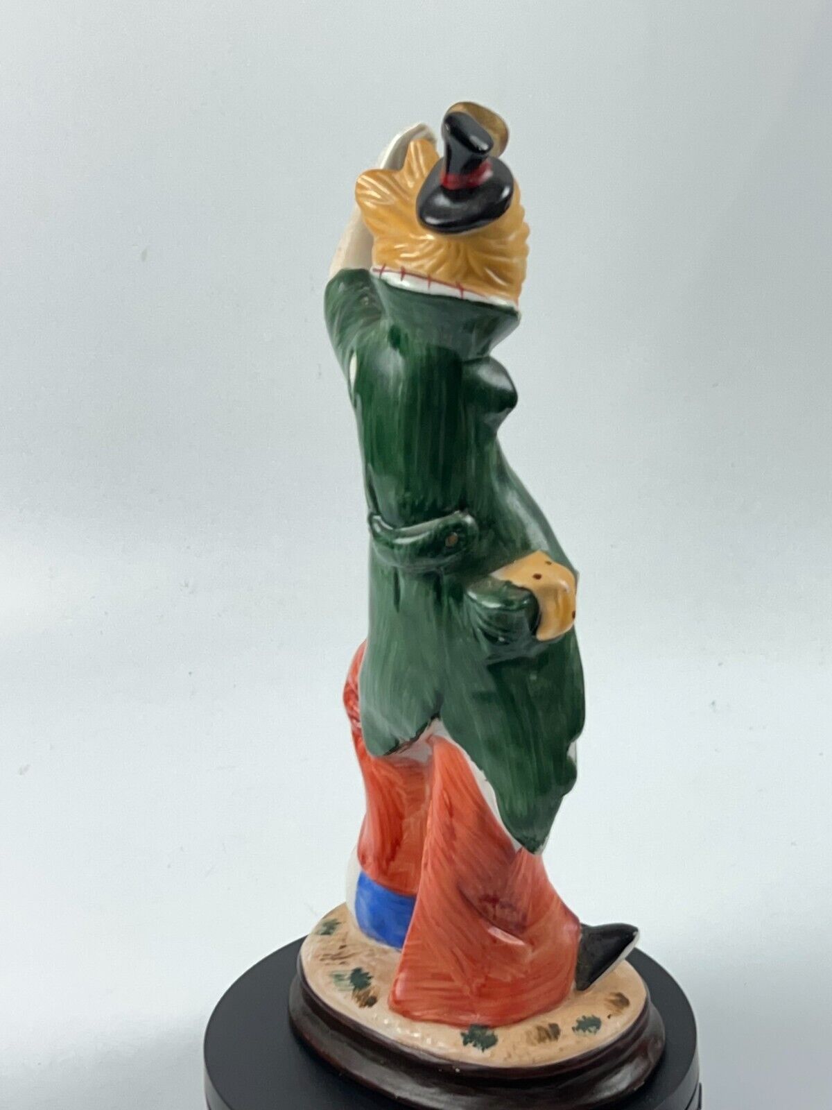 Vintage 11" Clown Blowing a Horn with a Foot on Beach Ball Statue Figurine