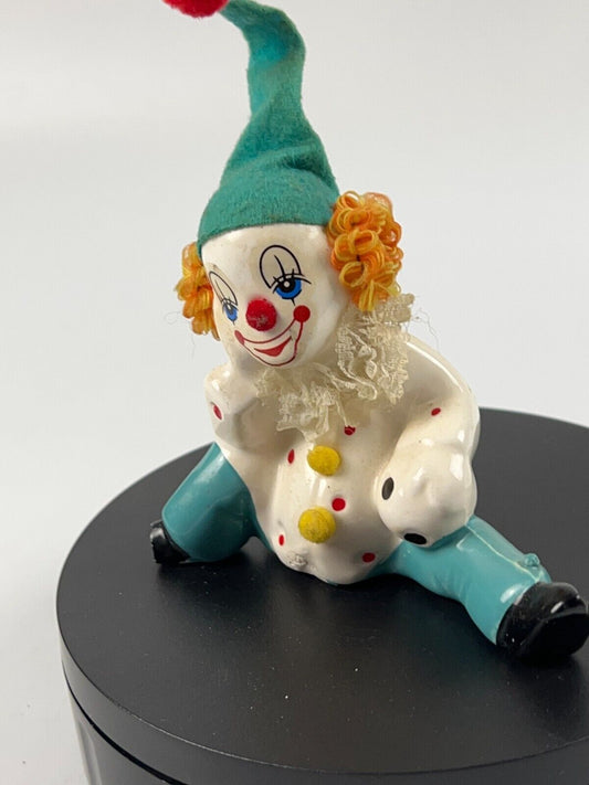 Vintage Miniature Porcelain Clown sitting down with soccer ball and felt hat