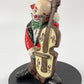 vintage figurine of  Porcelain white clown playing the bass cello