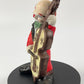 vintage figurine of  Porcelain white clown playing the bass cello