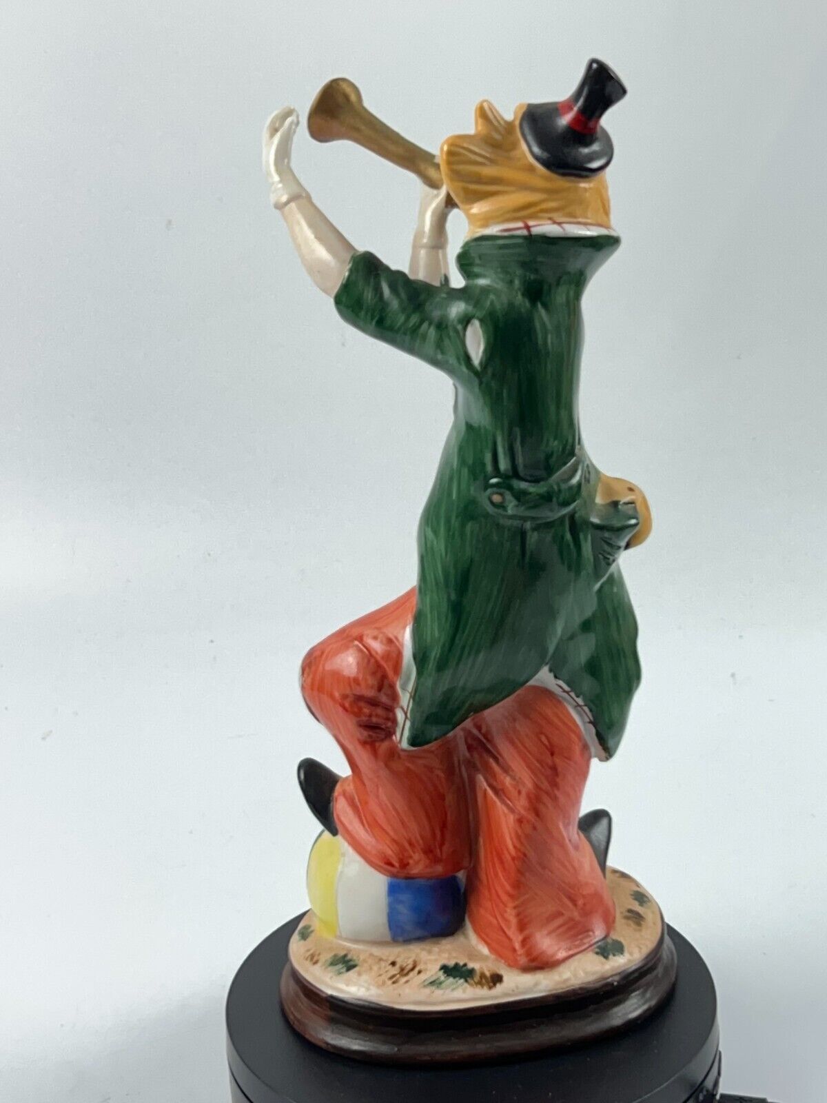 Vintage 11" Clown Blowing a Horn with a Foot on Beach Ball Statue Figurine