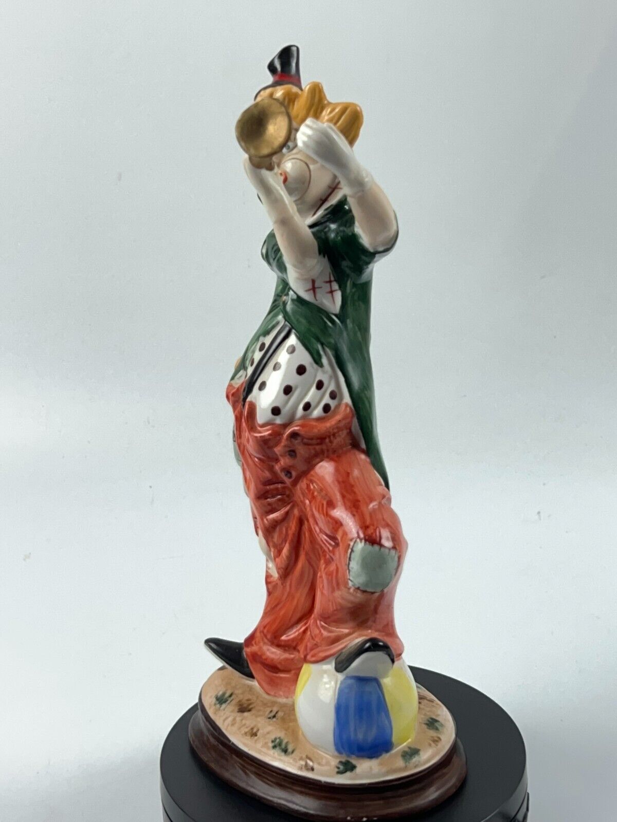 Vintage 11" Clown Blowing a Horn with a Foot on Beach Ball Statue Figurine