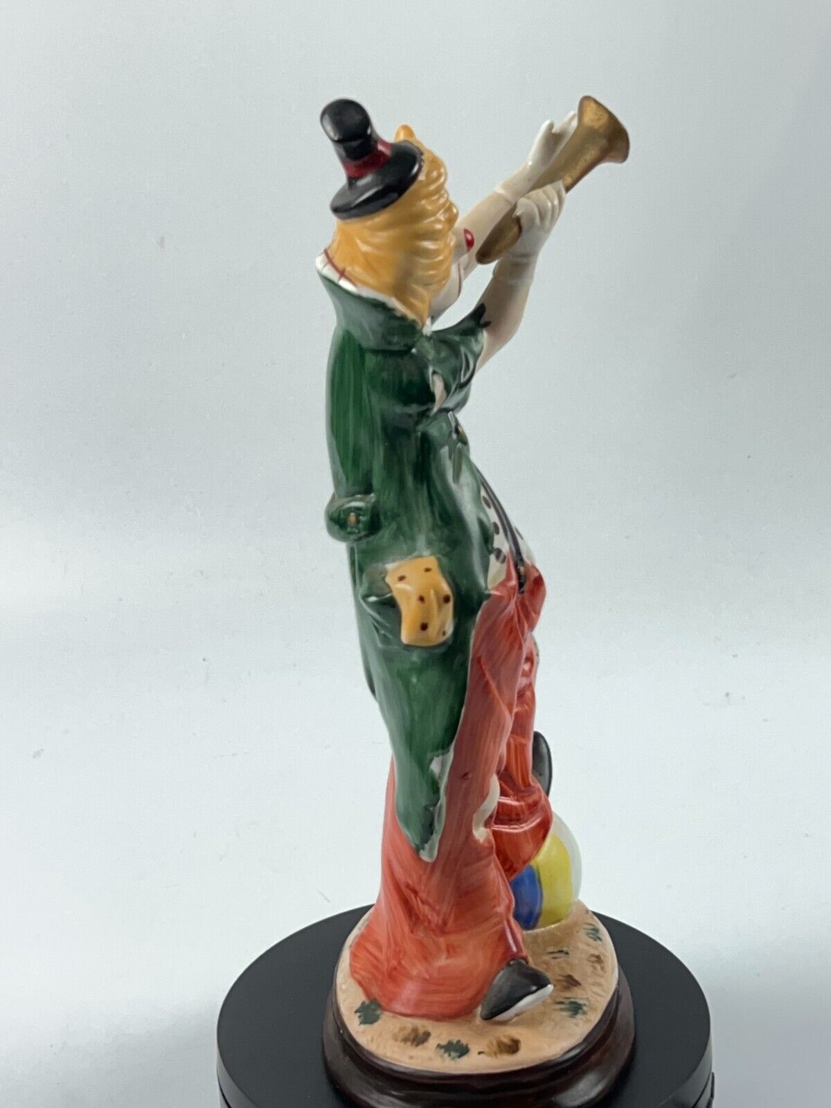 Vintage 11" Clown Blowing a Horn with a Foot on Beach Ball Statue Figurine