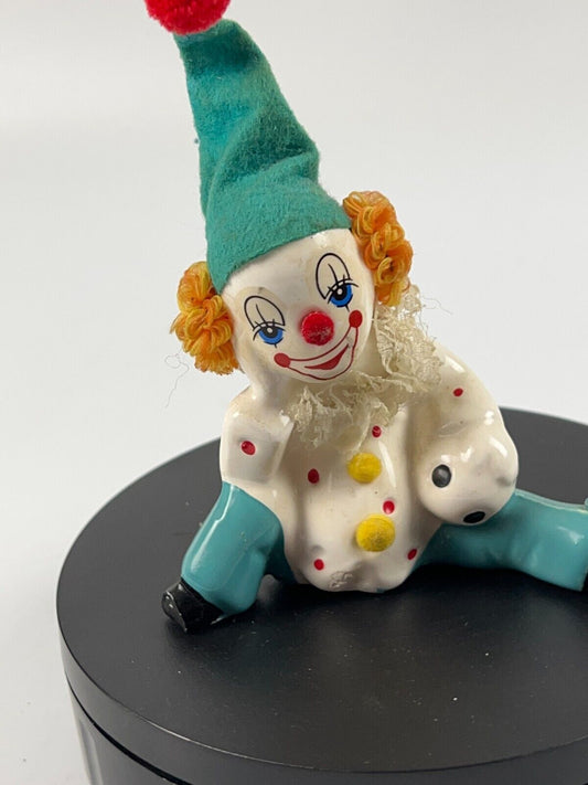 Vintage Miniature Porcelain Clown sitting down with soccer ball and felt hat