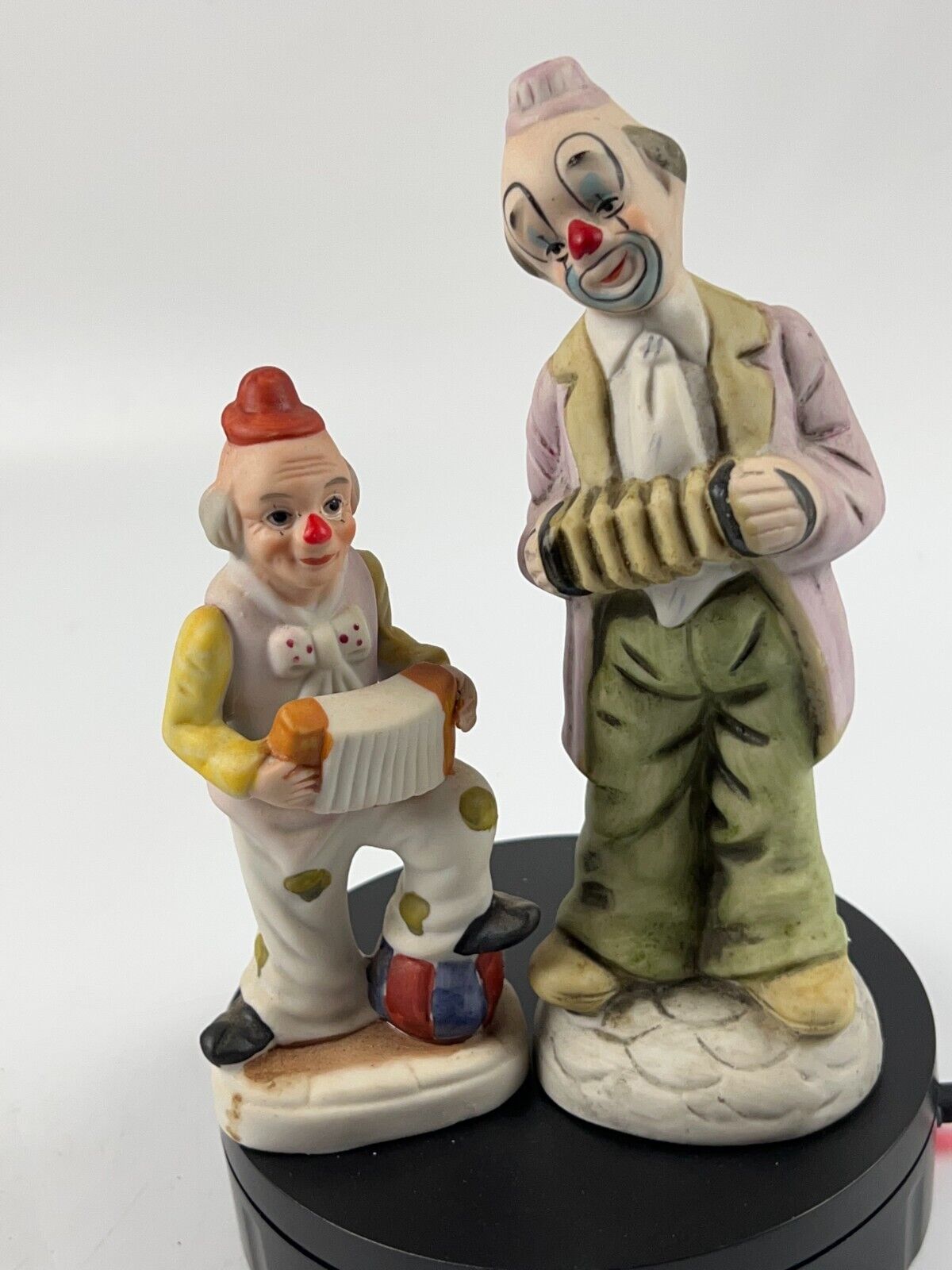 2 Vintage Bisque Porcelain Clown Figurine playing accordion 8 & 5in Tall