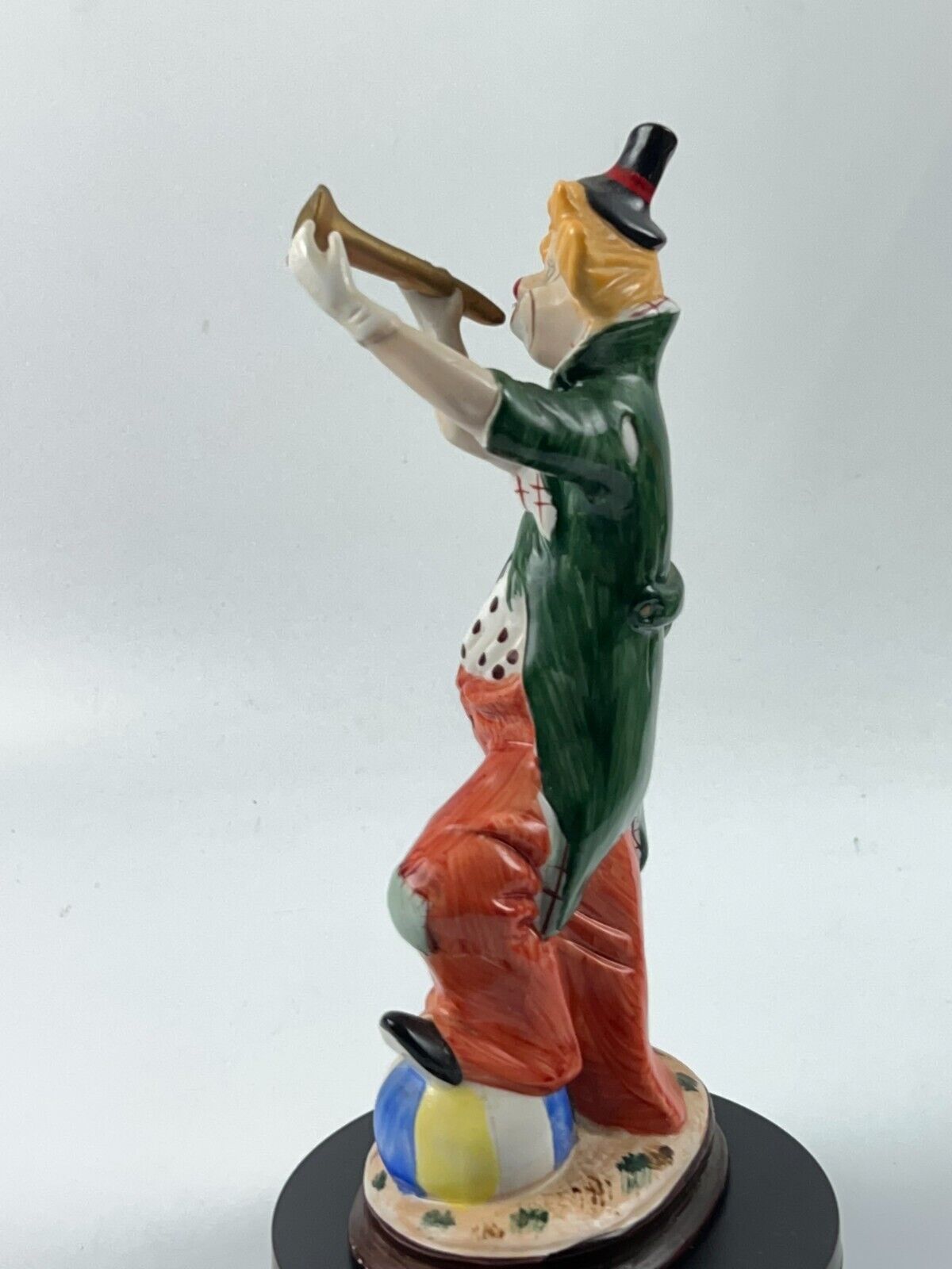 Vintage 11" Clown Blowing a Horn with a Foot on Beach Ball Statue Figurine